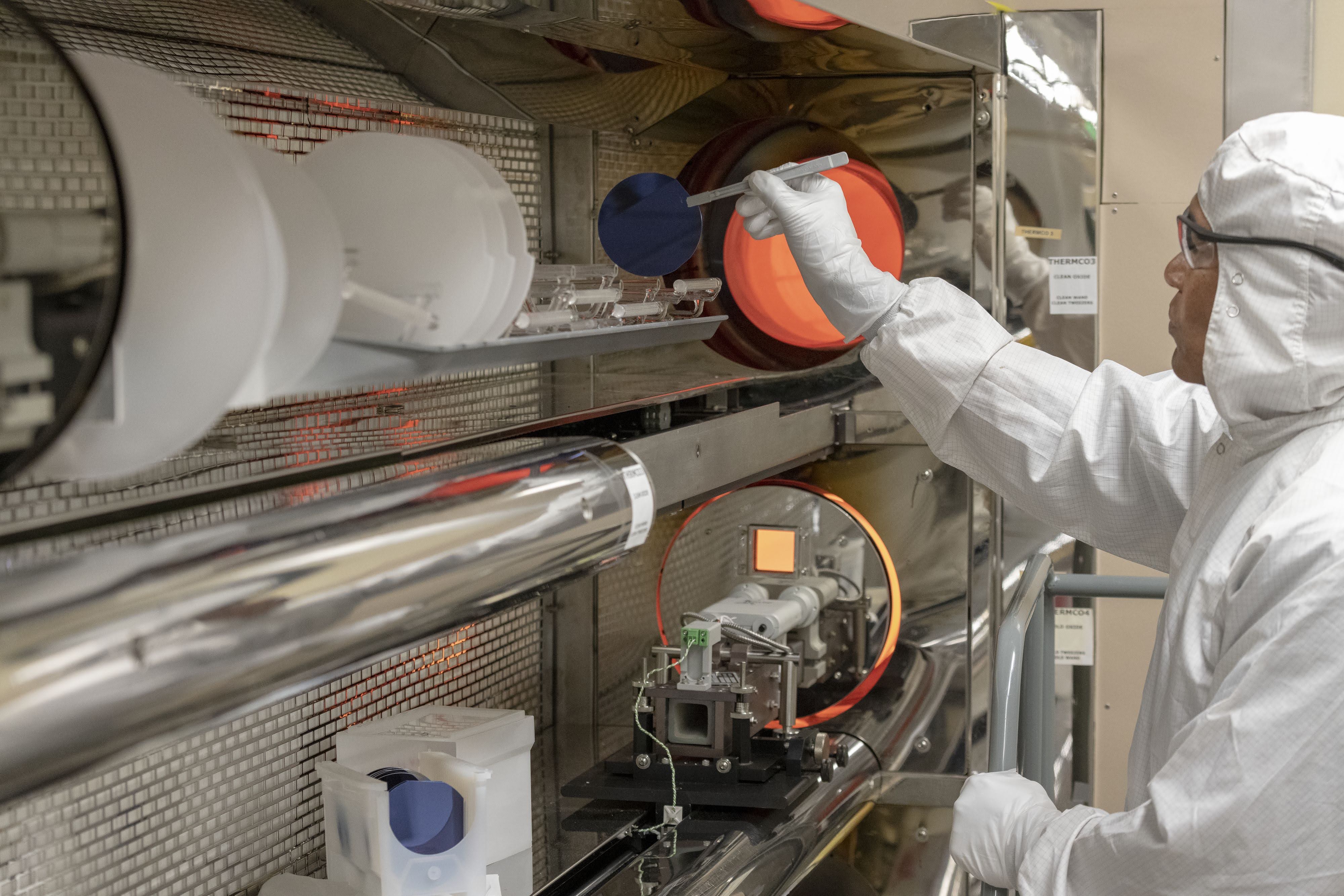 SNF staff Maurice Stevens works on the Thermco furnace. The SNF Thermco furnace can heat up to 1100 degrees Celsius. Thermco